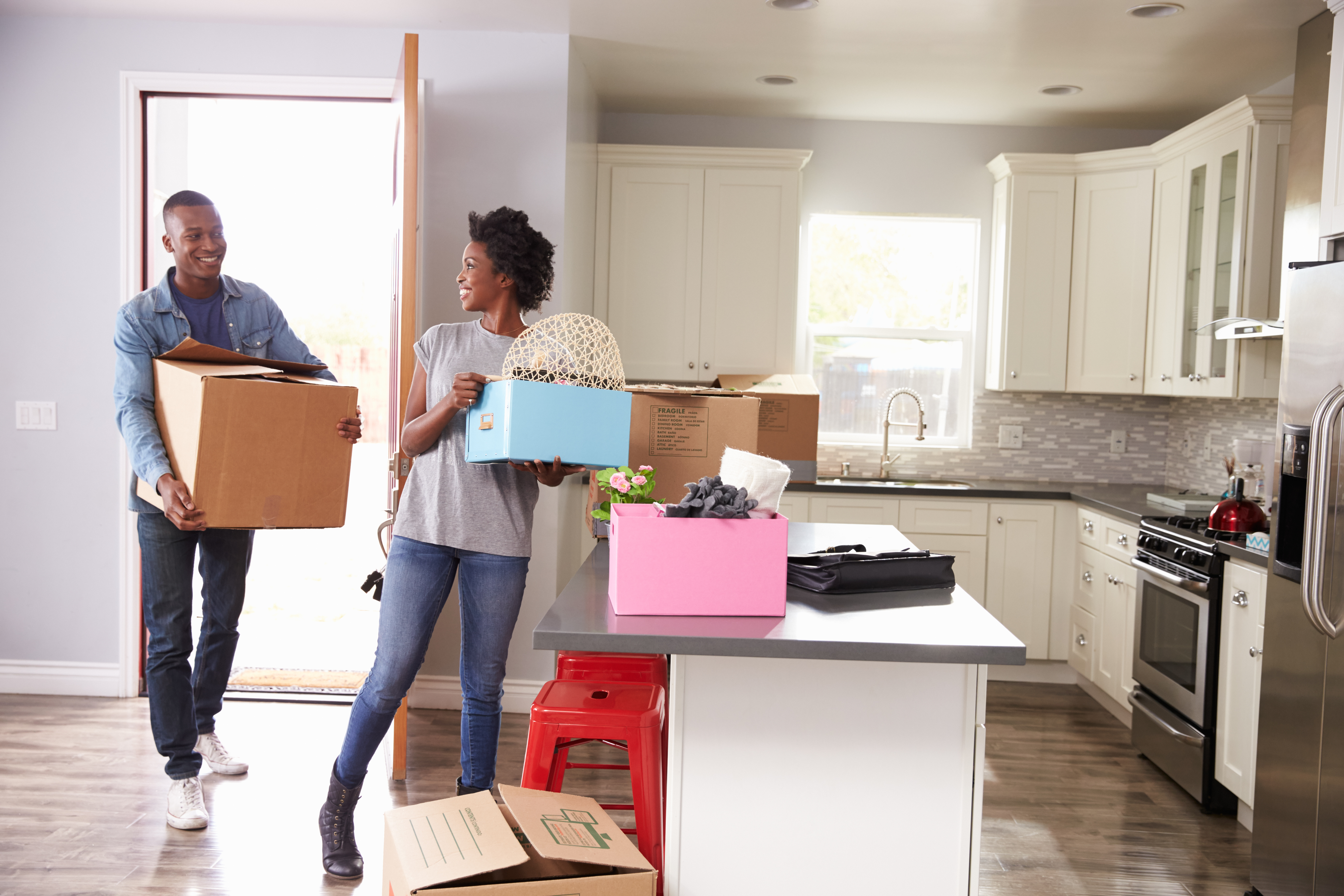 Young couple moving into new home together